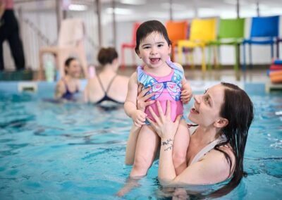infant-swimming-lessons-parent-holding-baby
