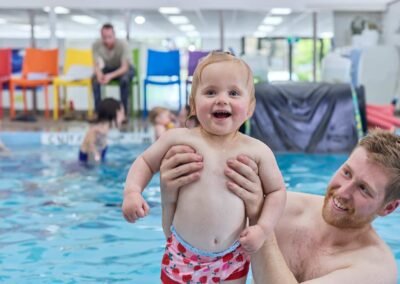 baby-swimming-lessons-dad-holding-baby